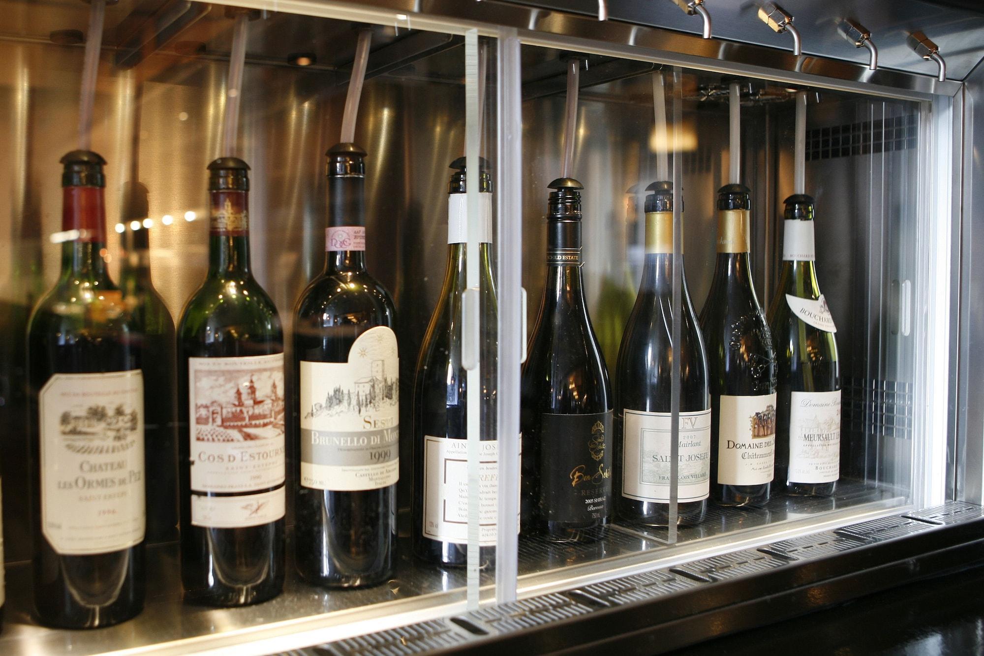 Montcalm Brewery, London City Экстерьер фото Wine bottles in a wine dispenser
